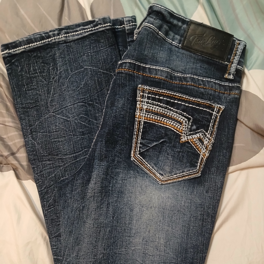 Blue Boot Cut Jeans with Distressed Vintage Look